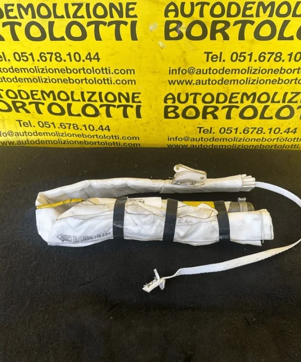 Dispositivo airbag a tendina