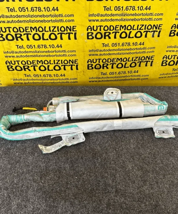 Dispositivo airbag a tendina