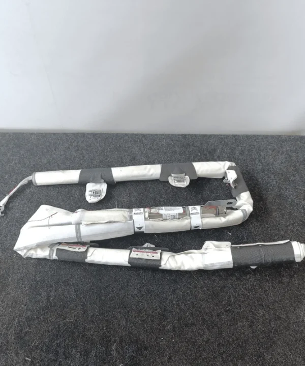 Dispositivo airbag a tendina