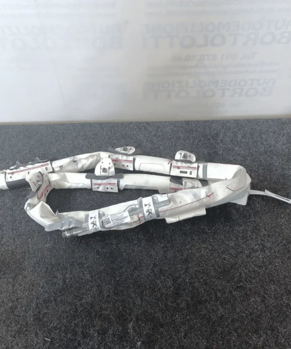 Dispositivo airbag a tendina